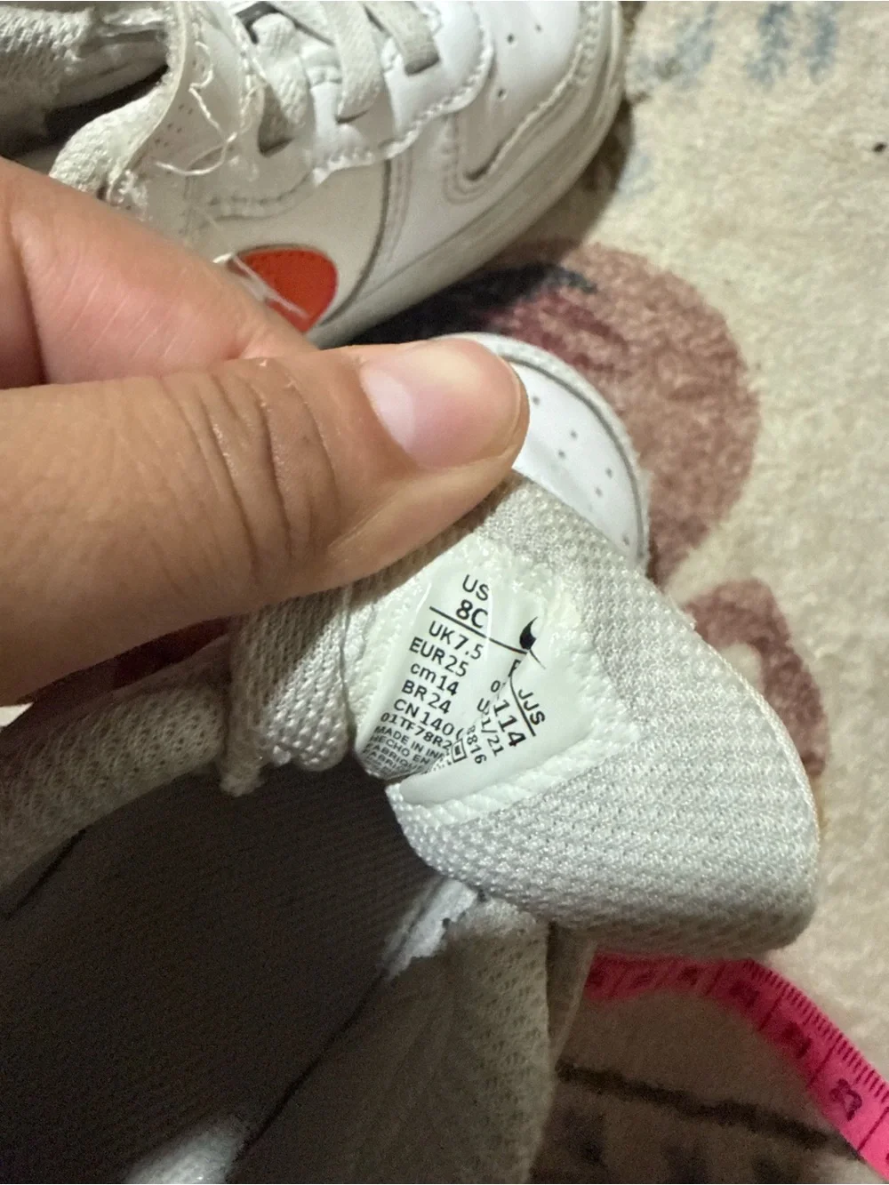 Nike White Kids Sneakers with Orange Swoosh Accent 8C